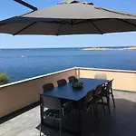 아파트 Direkt Am Meer-apartments Puntaplanka 로고즈니차